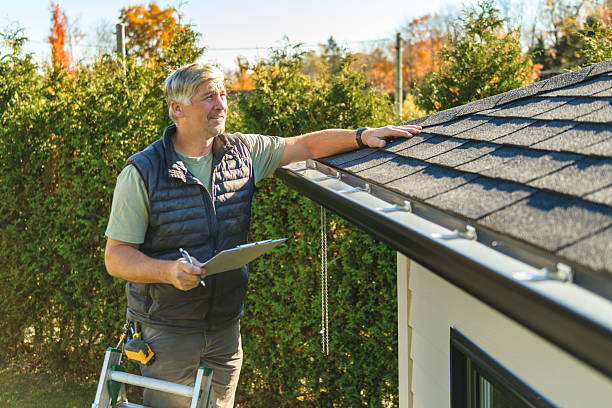 Professional Roofing technician working in Monroe, OR
